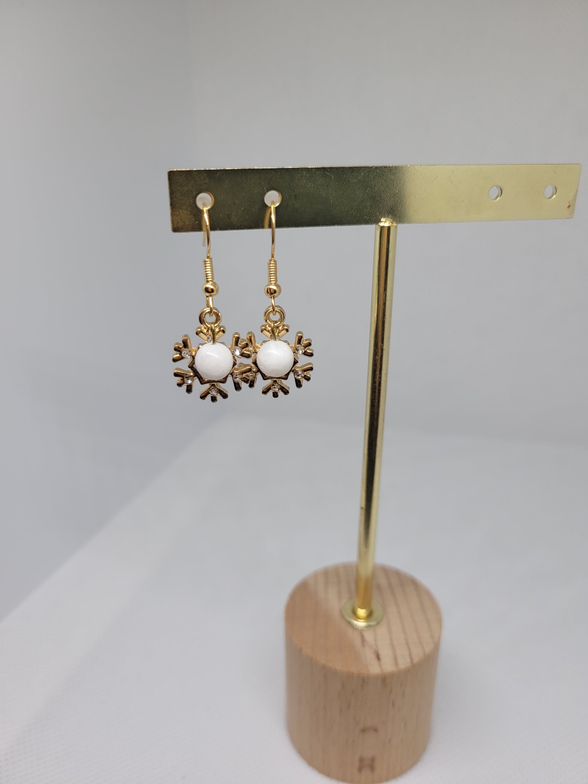 Boucles flocons et péristerite